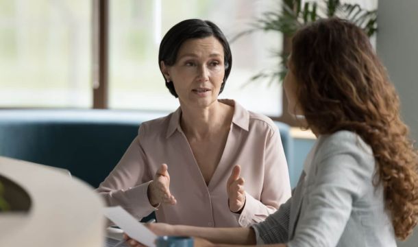 Two businesswomen having a discussion