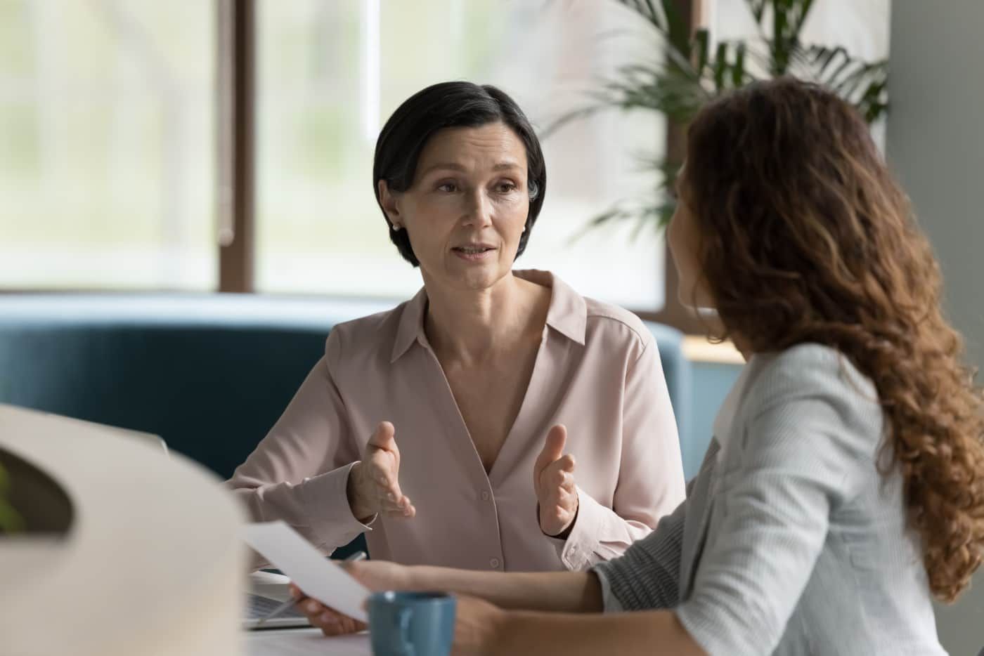 Two businesswomen having a discussion